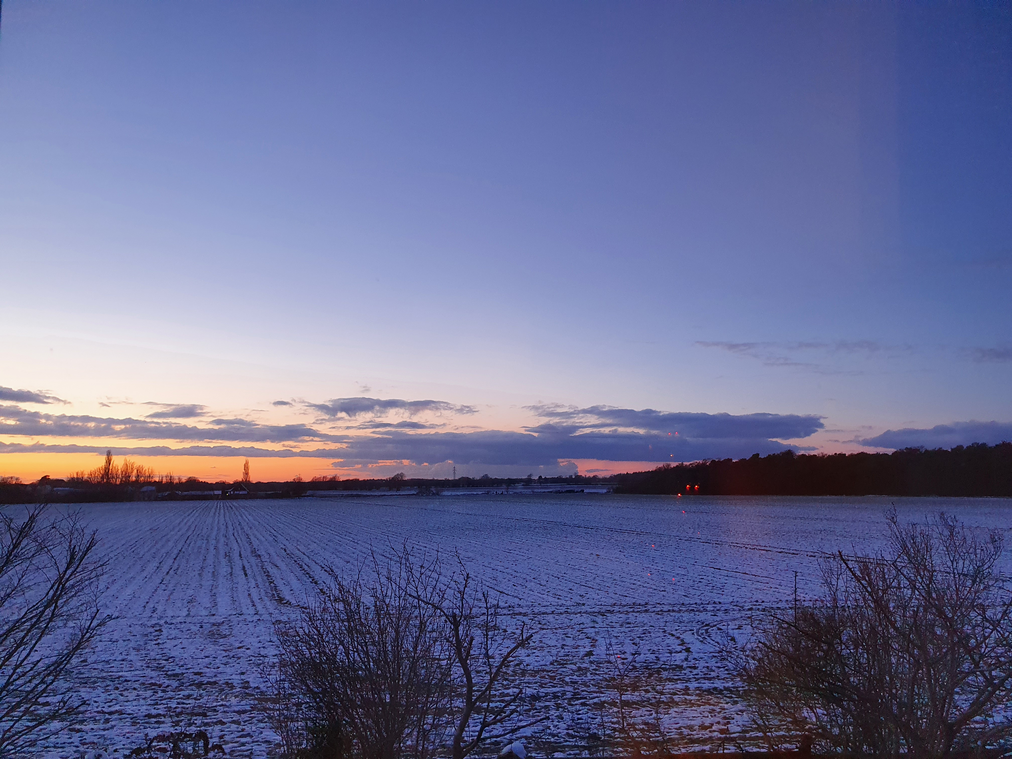 A snowy horizon at dusk