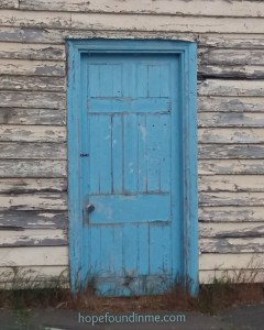 A Blue Weather Worn Exterior Door