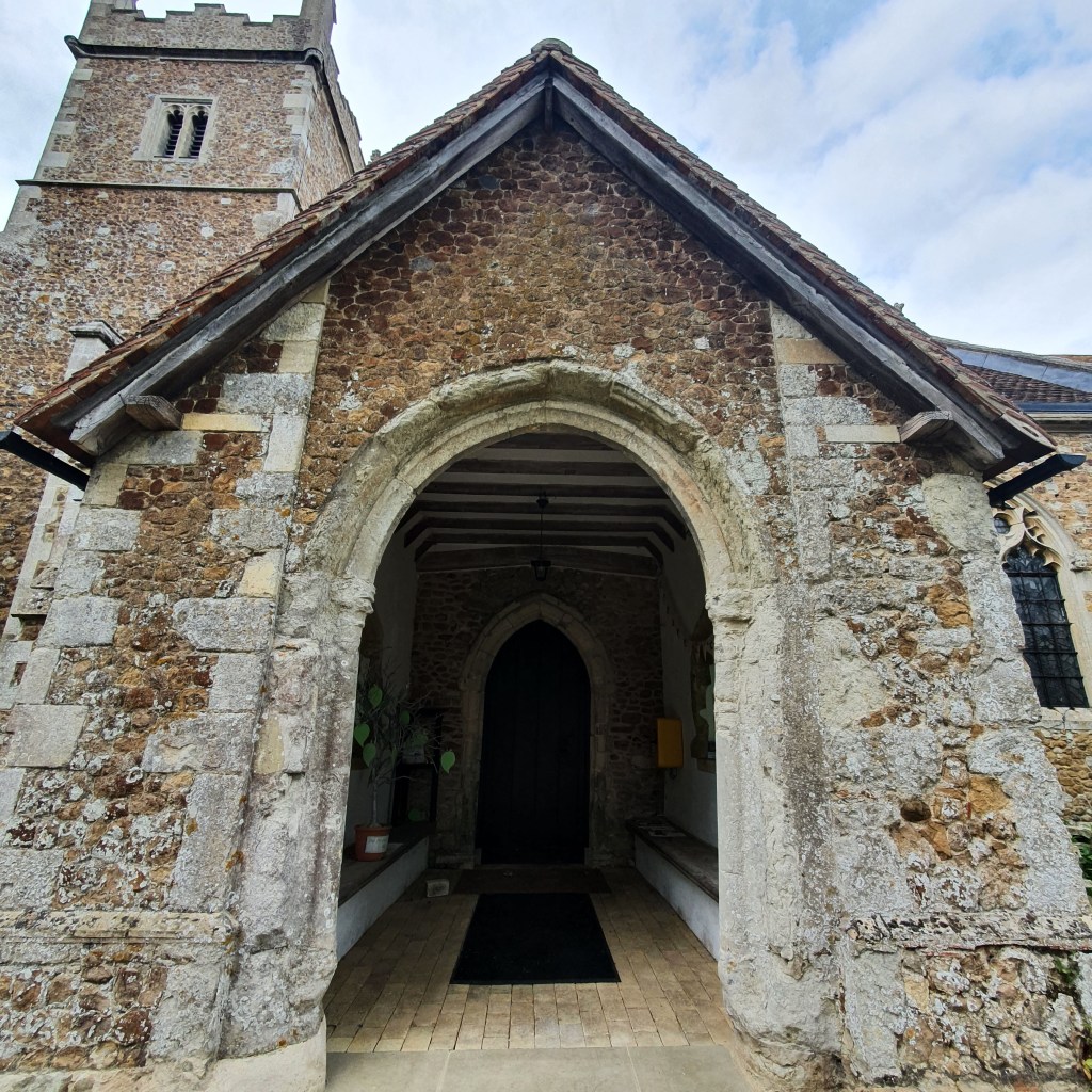 An Arched Stone Church Entrance Porch