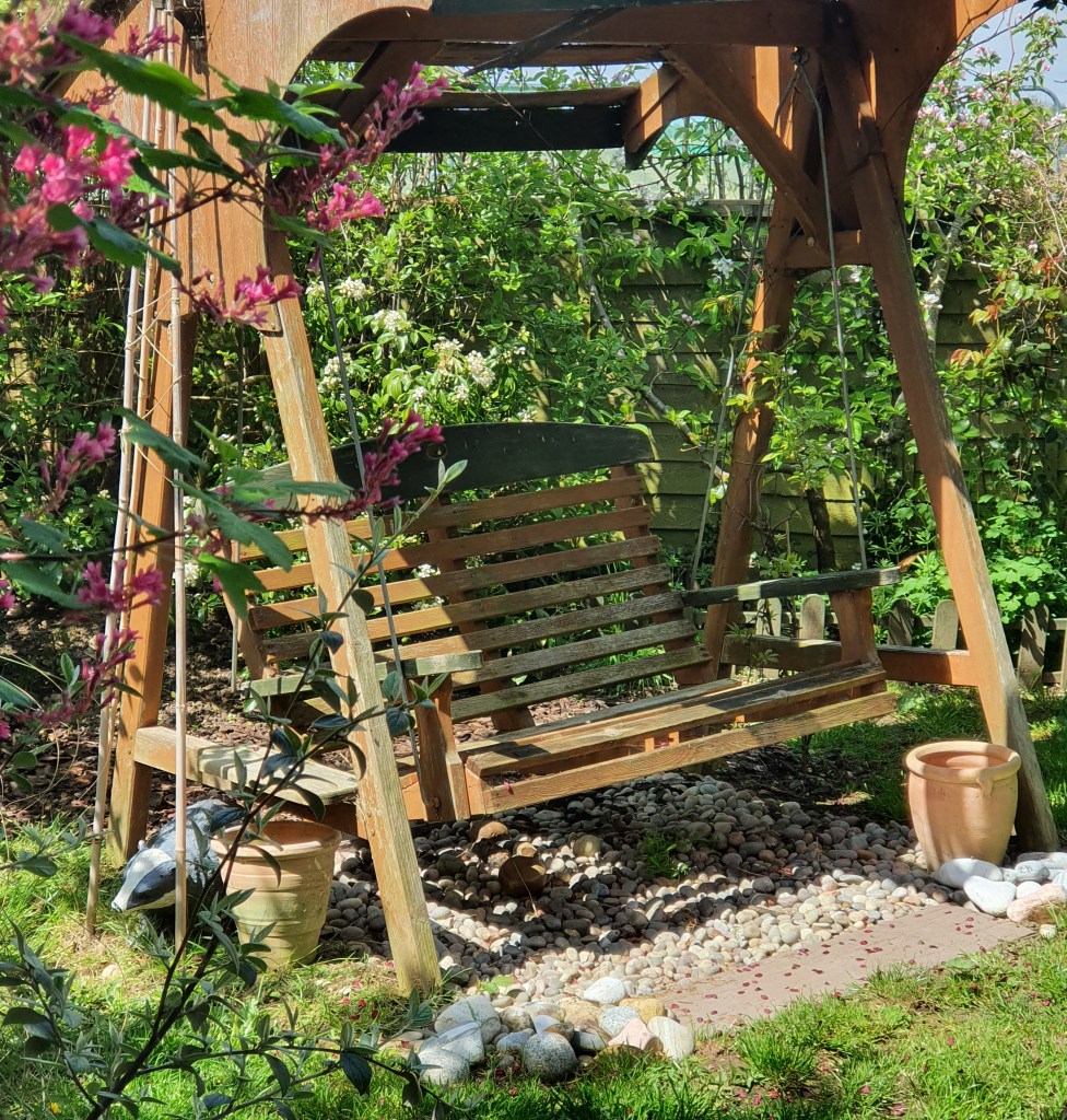 A Wooden Garden Swing Seat